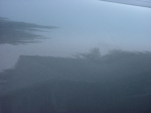 Passenger side fender dent