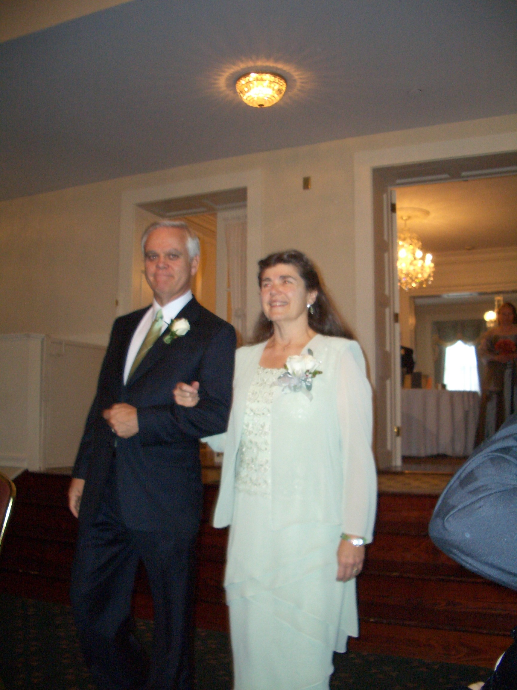 Marie's Mom escorted by her husband Frank.